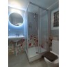 Private en-suite bathroom with sink, shower and toilet.
